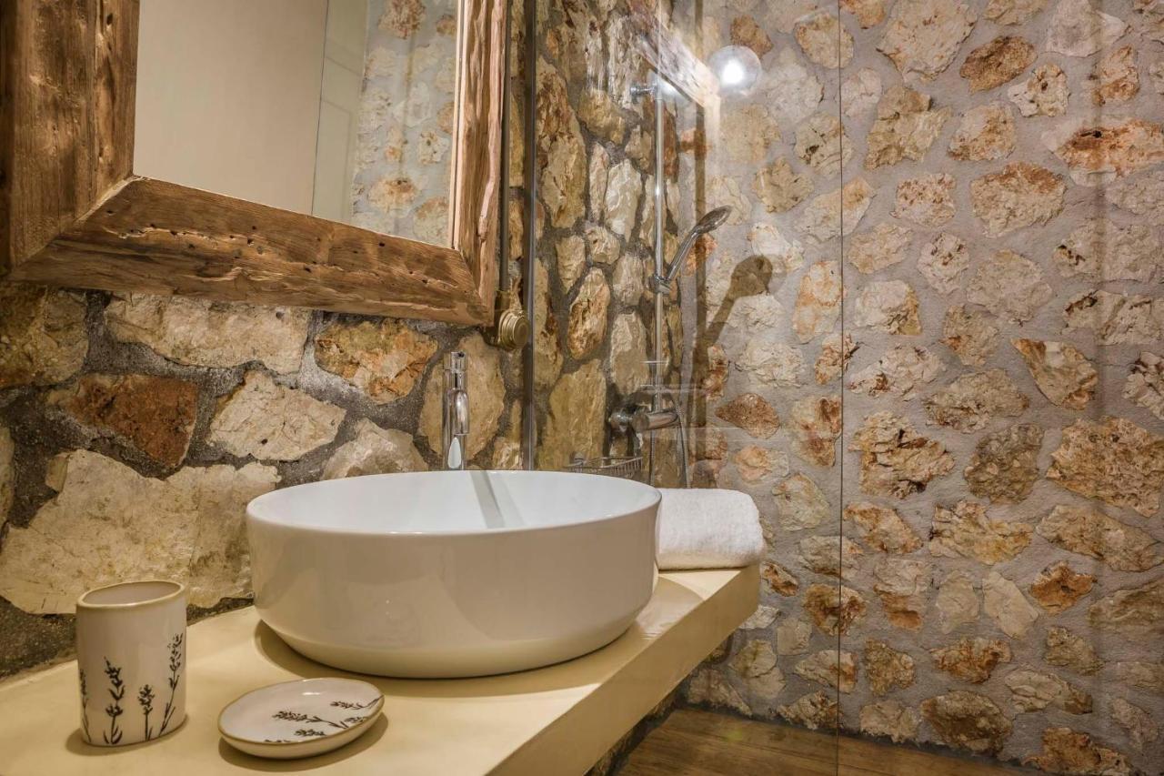 Ploes Luxury Cottages 佩萨达 外观 照片